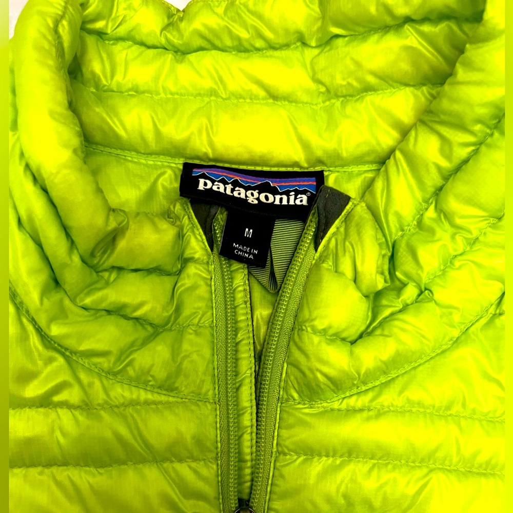 Patagonia men’s medium lime green puffer jacket.